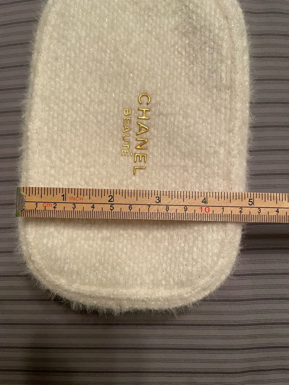 CHANEL white Faux-Fur makeup Case with Gold Logo